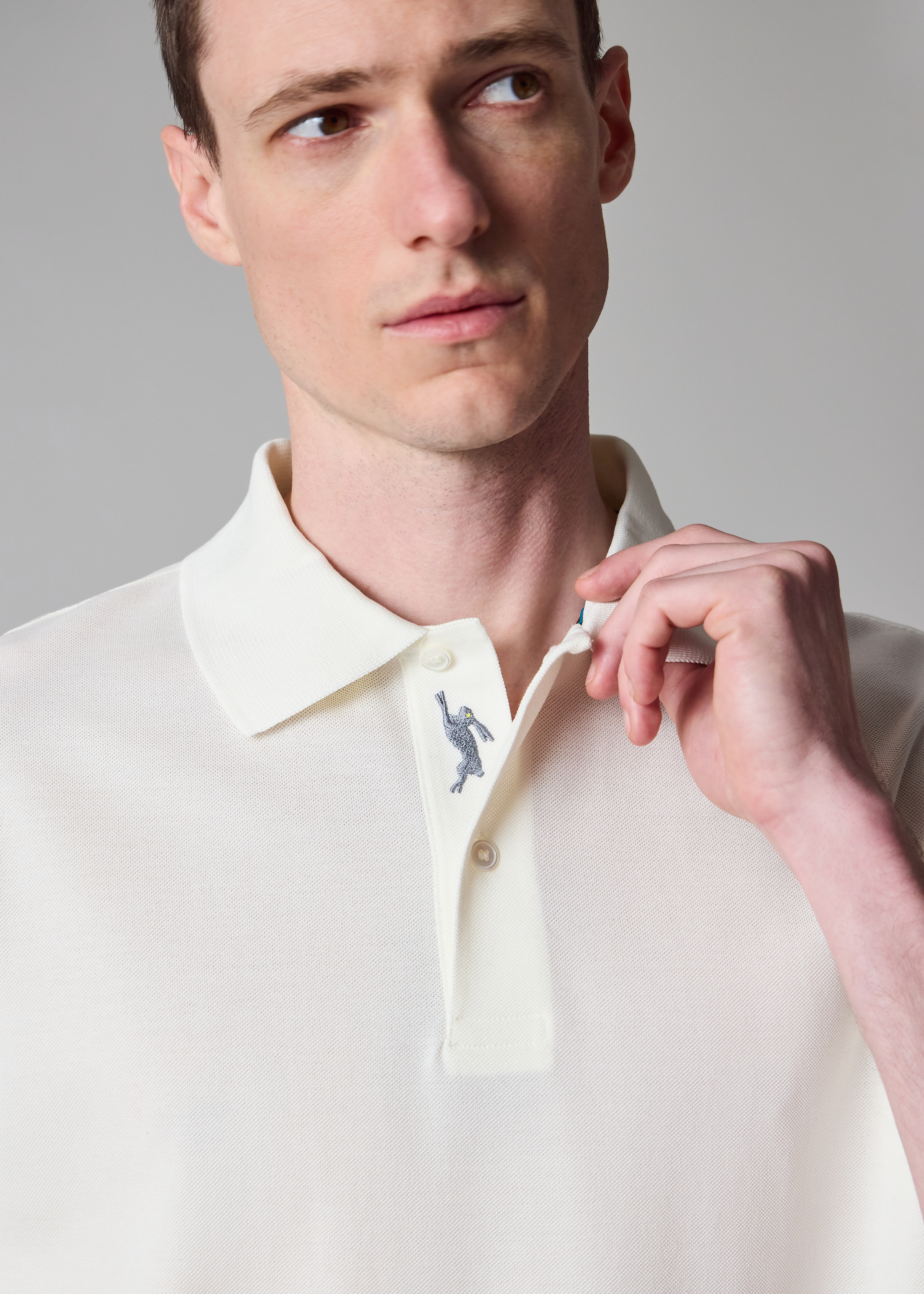 White Polo Shirt with Embroidered 'Rabbit' Placket