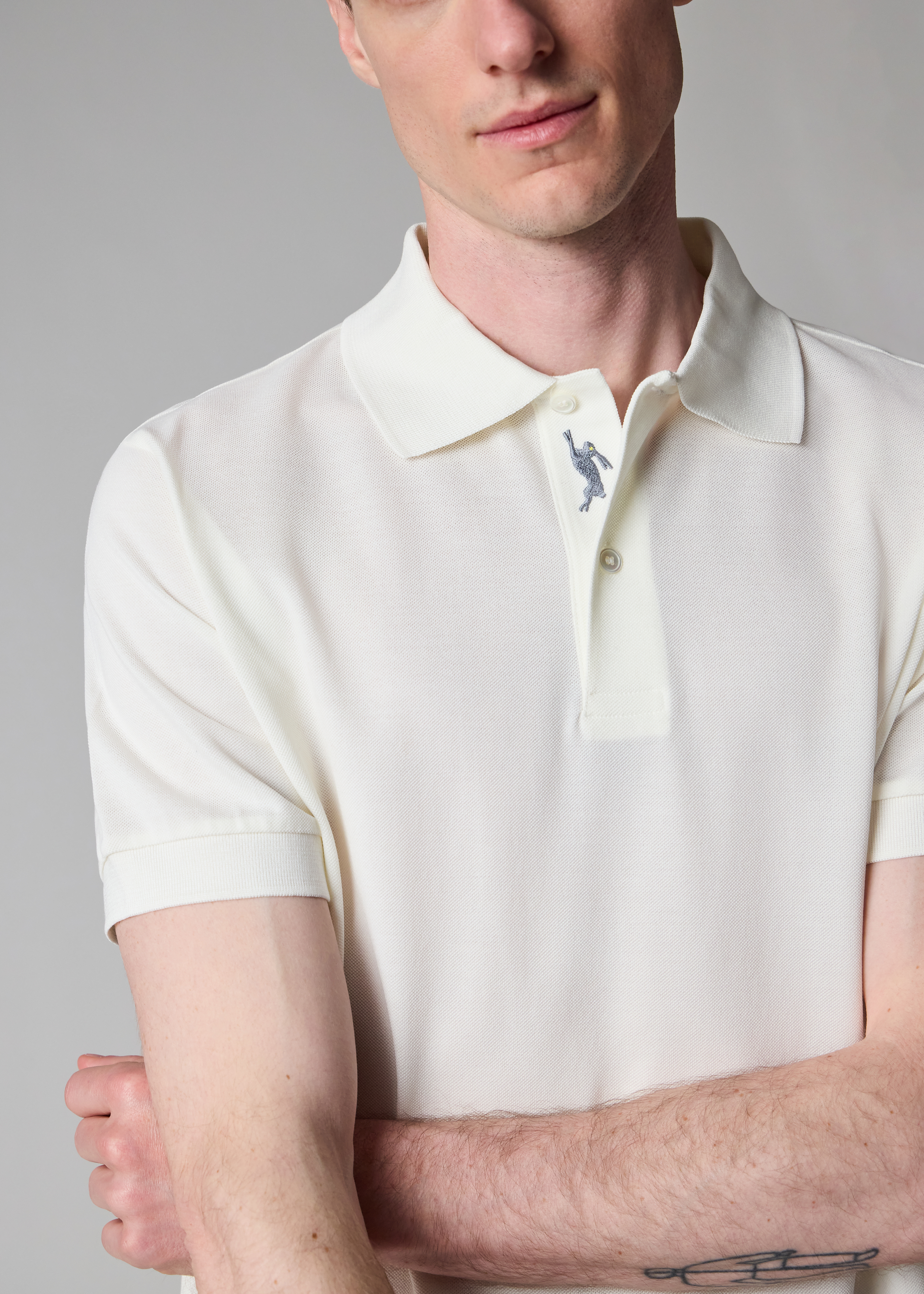 White Polo Shirt with Embroidered 'Rabbit' Placket