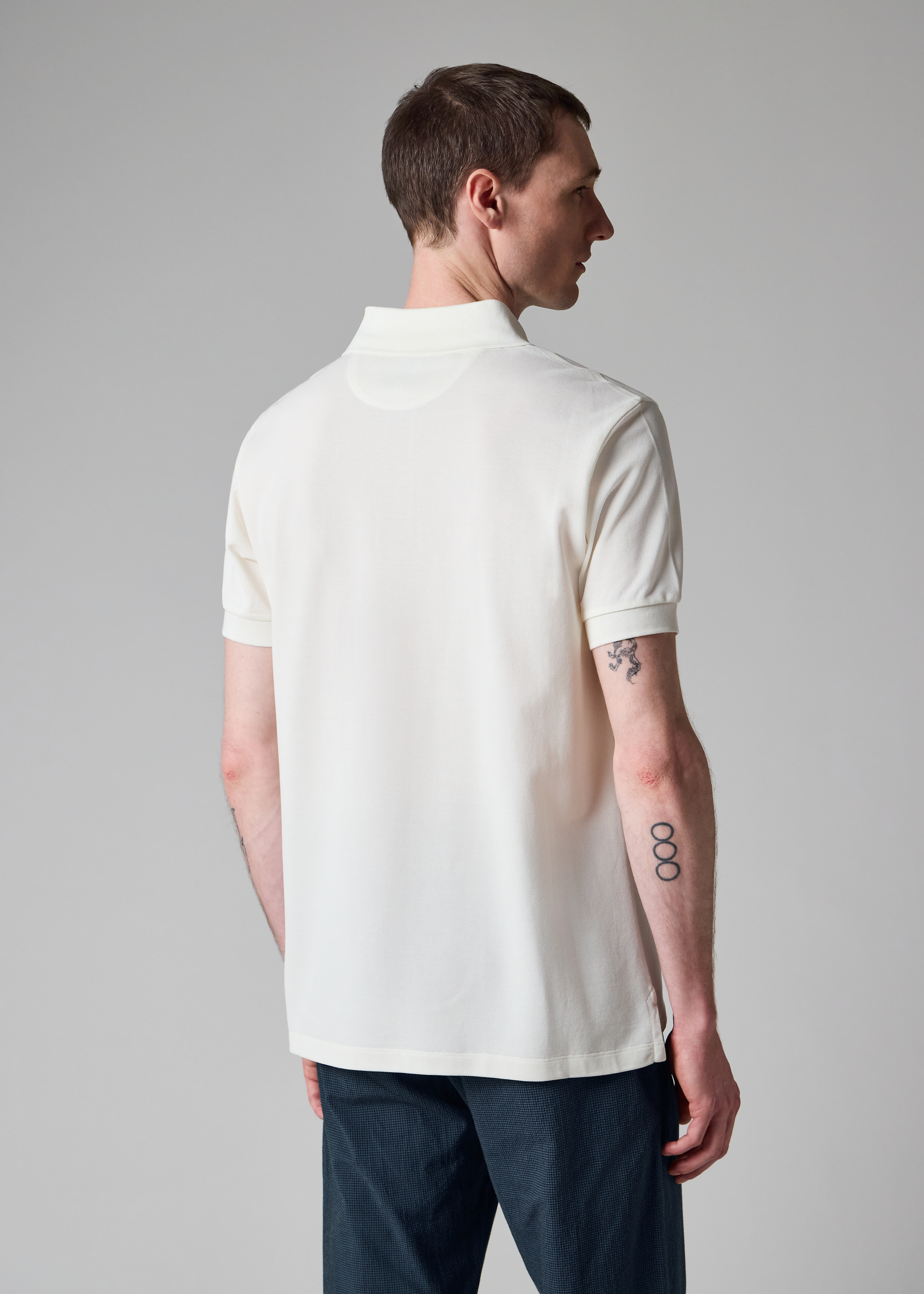 White Polo Shirt with Embroidered 'Rabbit' Placket